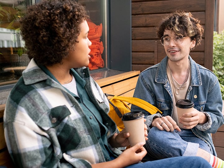 People sitting drinking coffee