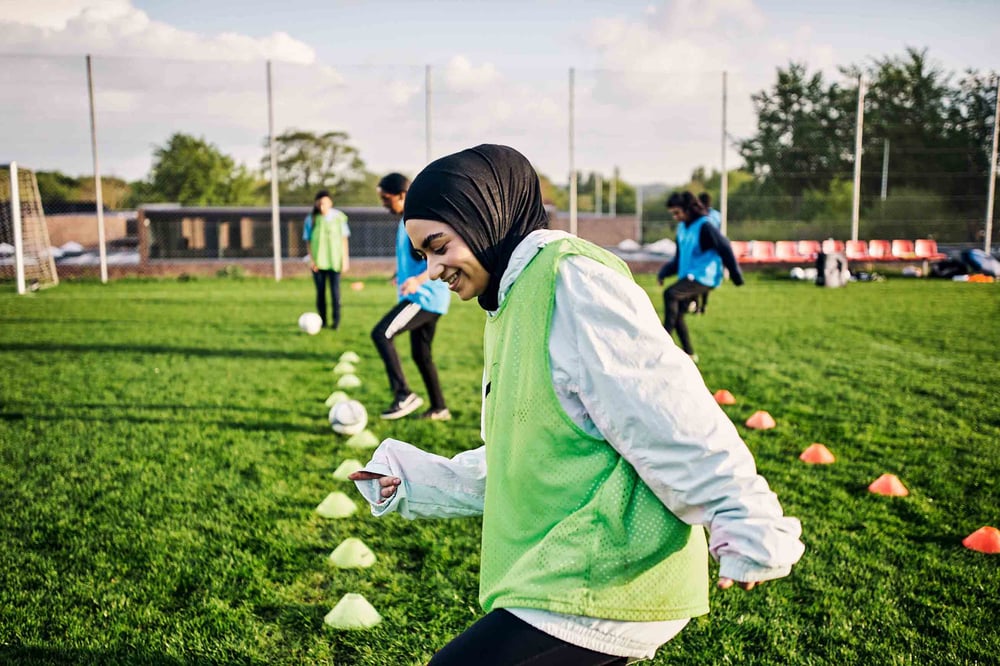 Person training for soccer