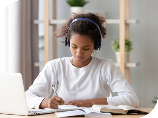 Student studying with headphones