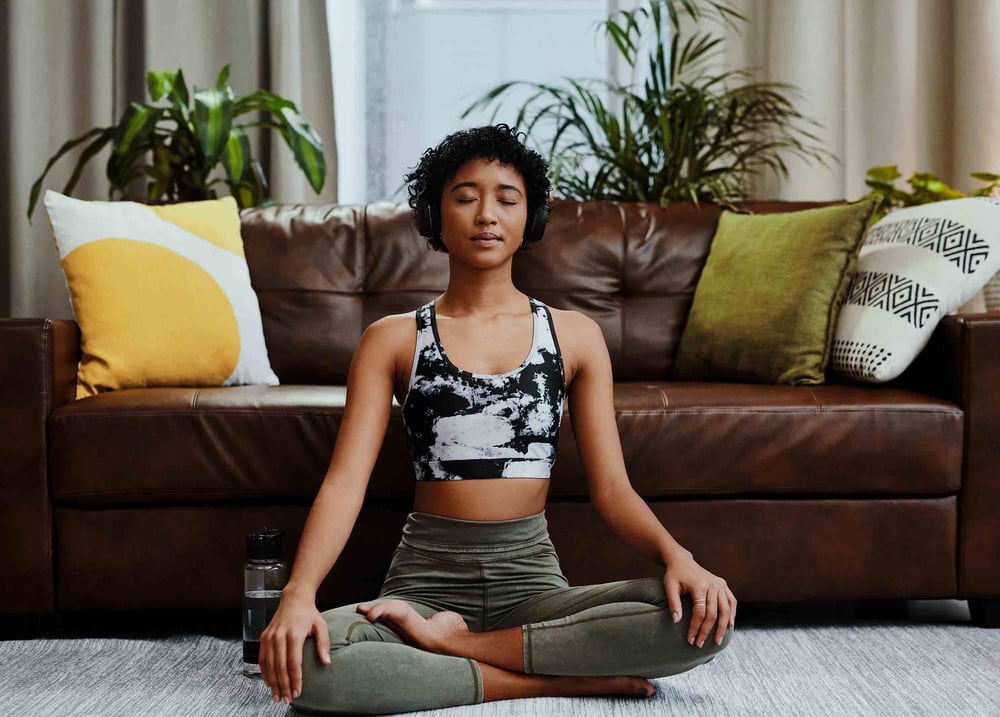 Person doing yoga at home