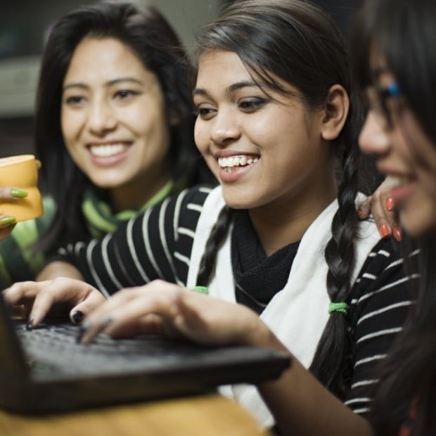 Three girls on laptop computer